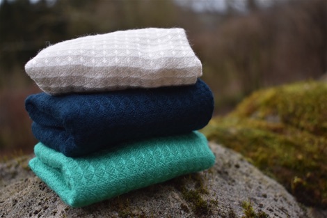 Stack of green, blue and white Seep bamboo cloths
